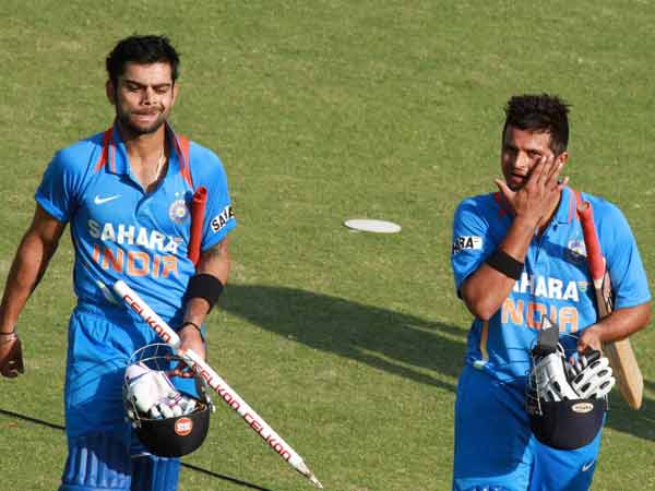 Virati Kohli and Suresh Raina
