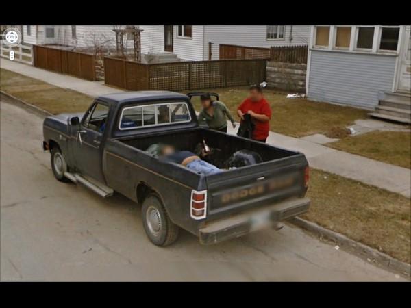 Man Drinking Beer and Lying in a Truck Bed
